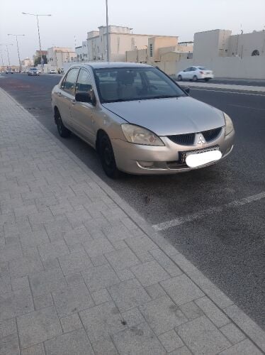 Mitsubishi Lancer 2006 — MzadQatar